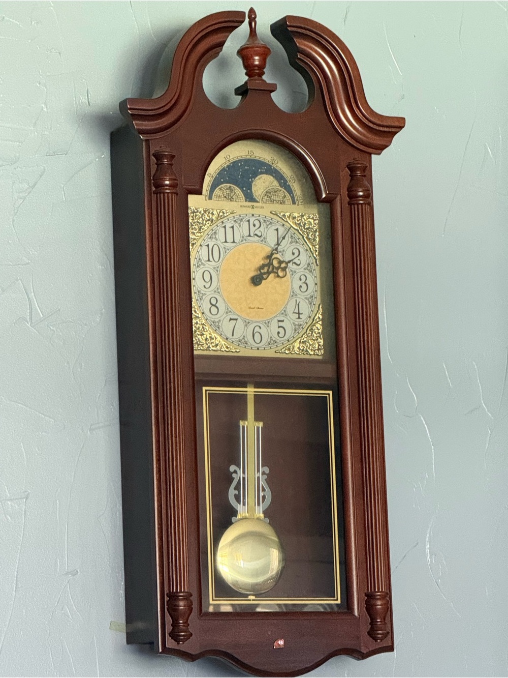 Howard Miller Wall Pendulum Clock in Rich Mahogany